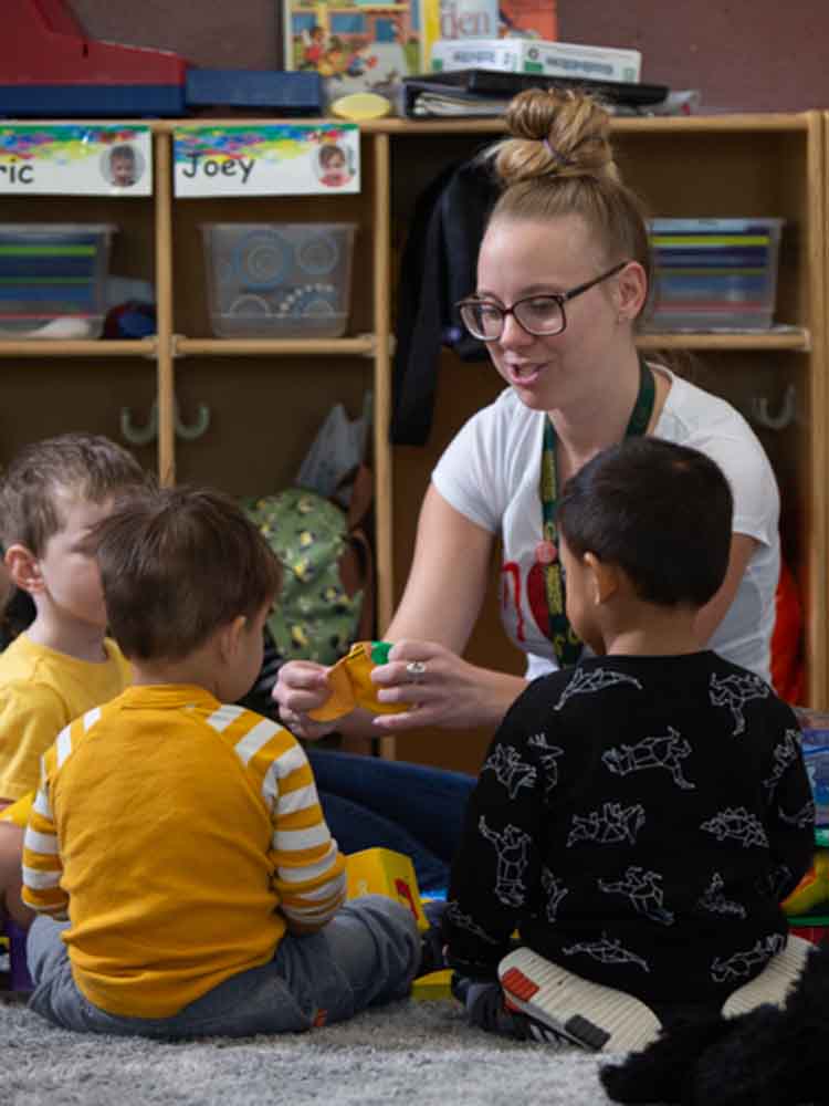 San Jac CDEC student engaging toddlers in early childhood activities