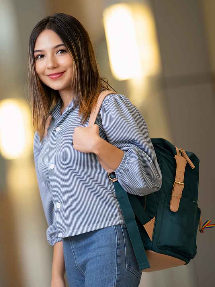 Female Promise student smiling with backpack